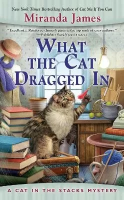 What The Cat Dragged In: A Cat In the Stacks Mystery #14
